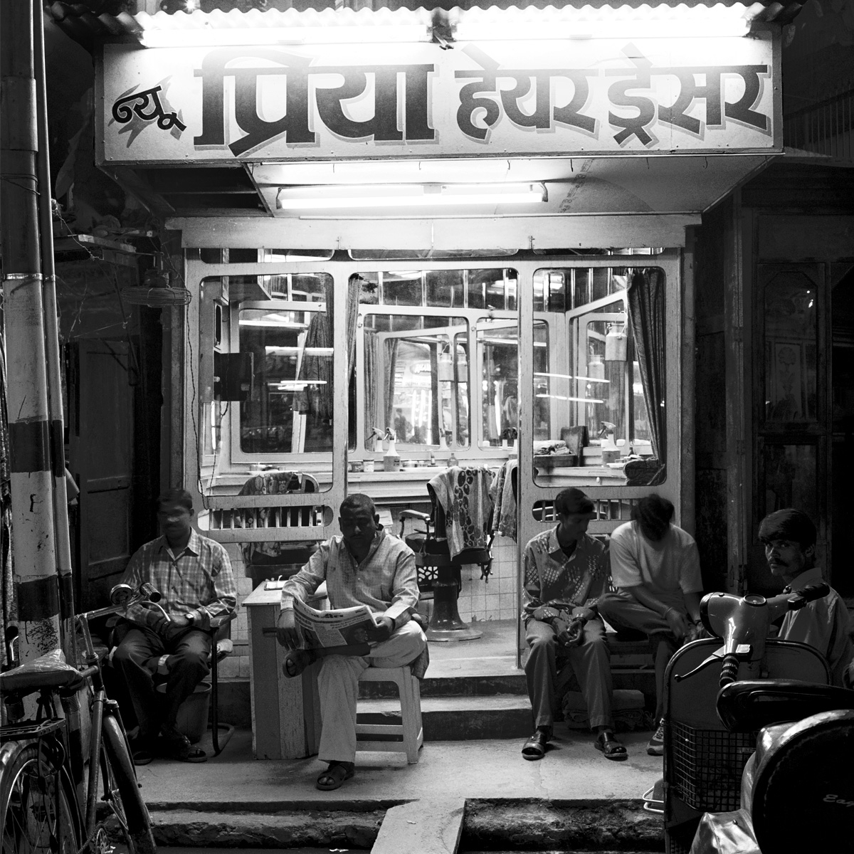 A barber shop on Dasaswamedh Ghat Road, Varanasi, Uttar Pradesh.