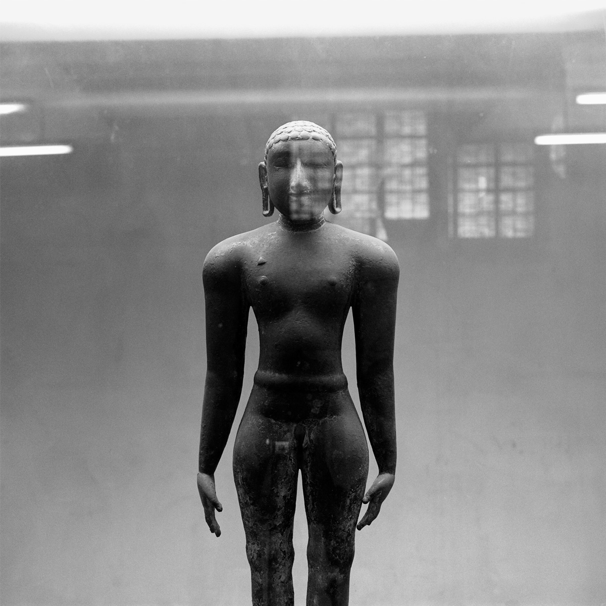 Sculpture of Jain tirthankhara (front) at the state museum, Chennai, Tamil Nadu.
