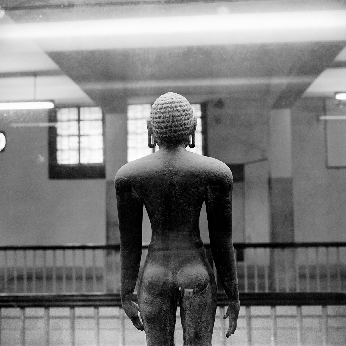 Sculpture of Jain tirthankhara (back) at the state museum, Chennai, Tamil Nadu.