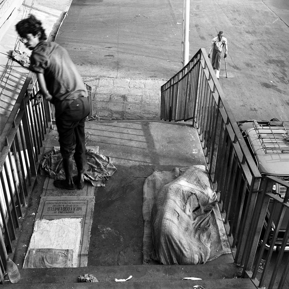 Homeless men along P. D'Mello Road, Mumbai, Maharashtra.