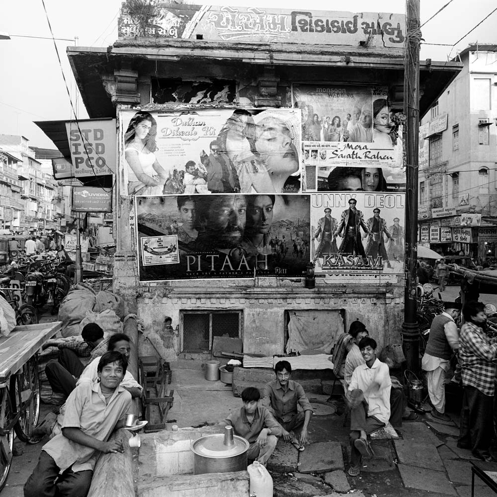 Movie posters on a building along Gandhi Road, Ahmedabad, Gujarat.