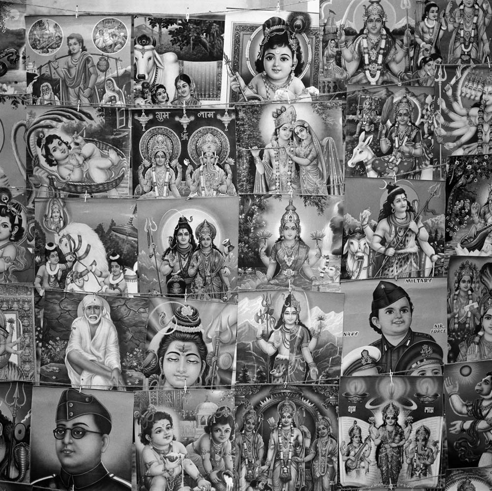 Sidewalk poster display, Ram Nagar, Uttar Pradesh.